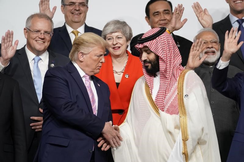 Trump shakes hands with Saudi Arabia's Crown Prince Mohammed bin Salman at the G-20 summit in Osaka, Japan, June 2019 